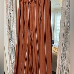 Never worn Buckle pants. Fun for Fall, Spring, and Summer casual.